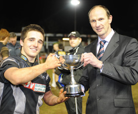 Elite Performance Director Graeme Maw presents Ospreys U16 captain Ryan Jones with the trophy